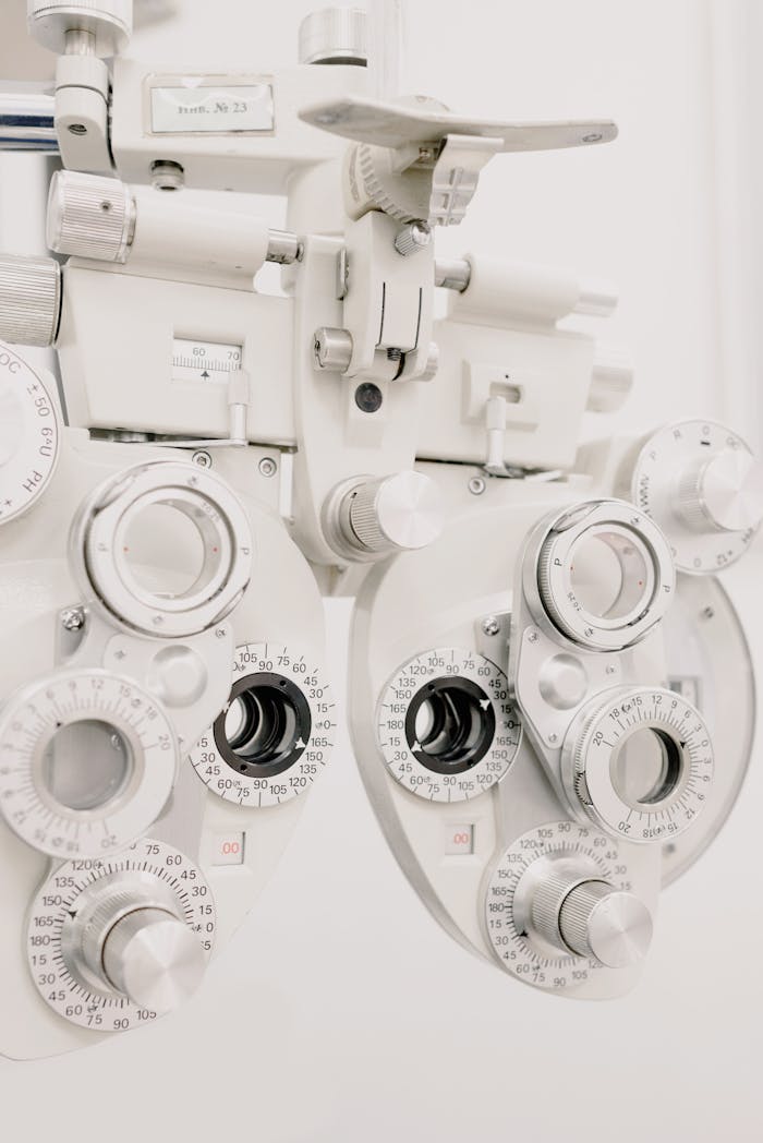 Contemporary medical optician clinical testing machine for checking eyesight in diagnostic center against white background